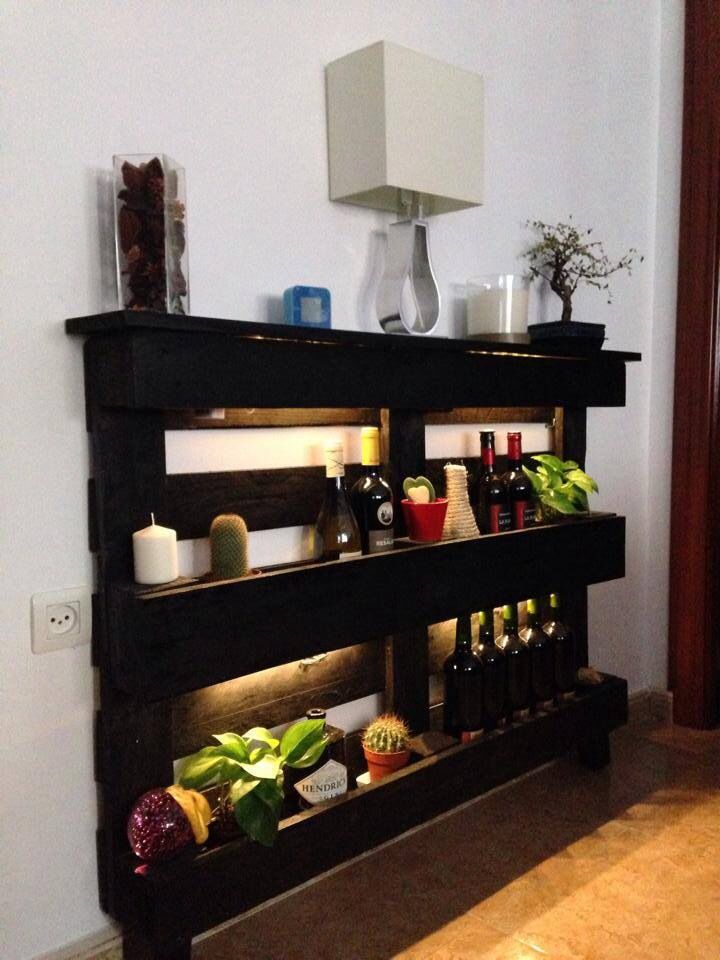 Envision A Three Layered Shelf Made From Used Pallets Painted In Black