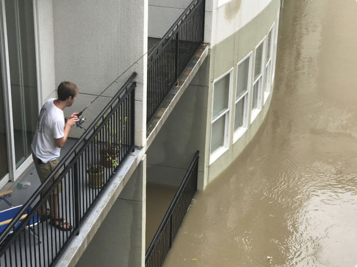 My Friend Fishing From His Balcony In Houston