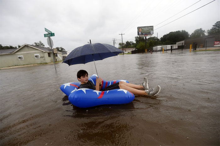 Julius Verret, 14, Floats In Street Flooding In Lake Charles