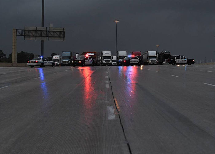 Police Block Traffic Following Closure Of The I-10 Freeway Leading Into Houston