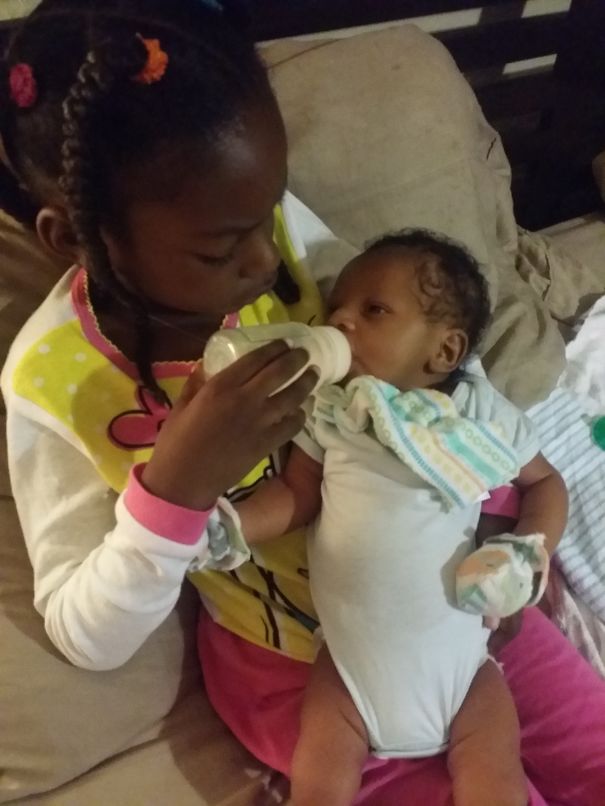 My 6yr Old Daughter Journi, feeding Her 3 Week Old Baby Brother At 6:30 Am; she Is So Nurt