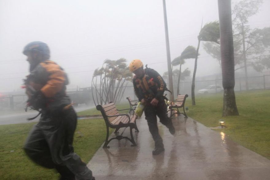 Members Of The Civil Defence Run As Hurricane Irma Howls Past Puerto Rico