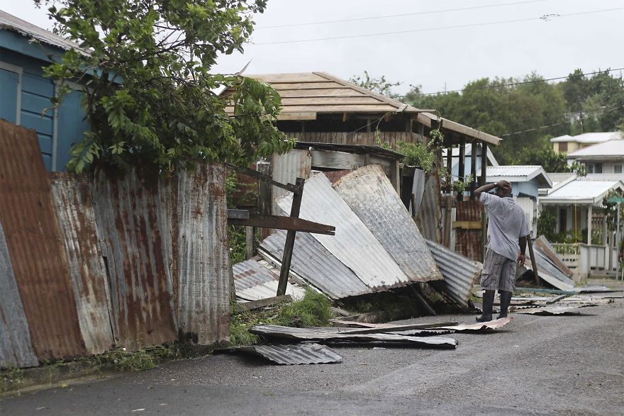 A Man Surveys The Wreckage On His Property After The Passing Of Hurricane Irma, In St. John's, Antigua, And Barbuda