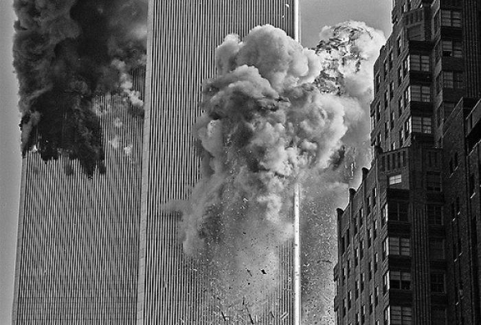 The Second Plane Flew Directly Over My Head And Slammed Into The South Tower. It Took Me A Few Seconds To Get My Head Together, And This Was The Shot I Took