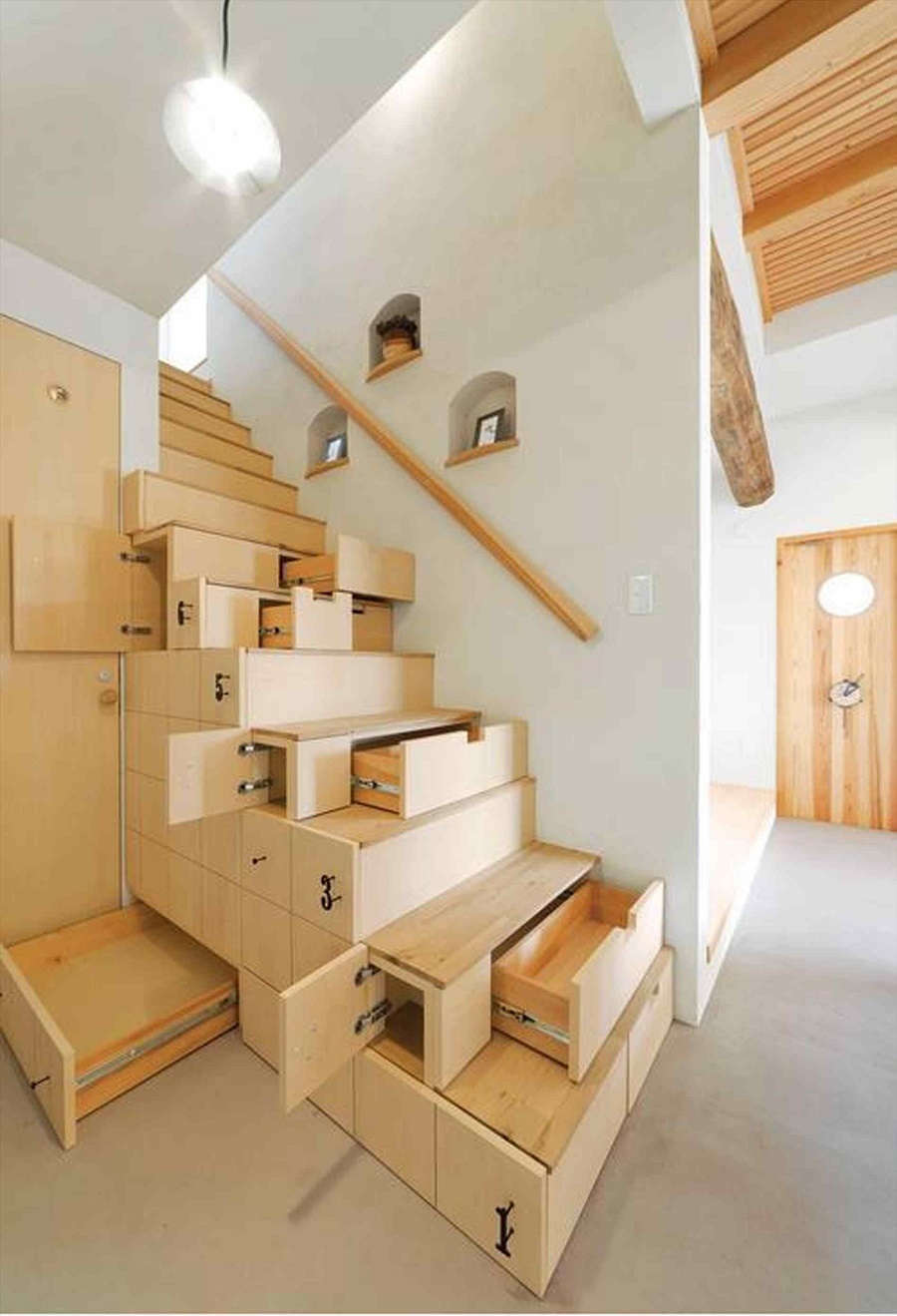 Use all the space productively with staircase drawers.