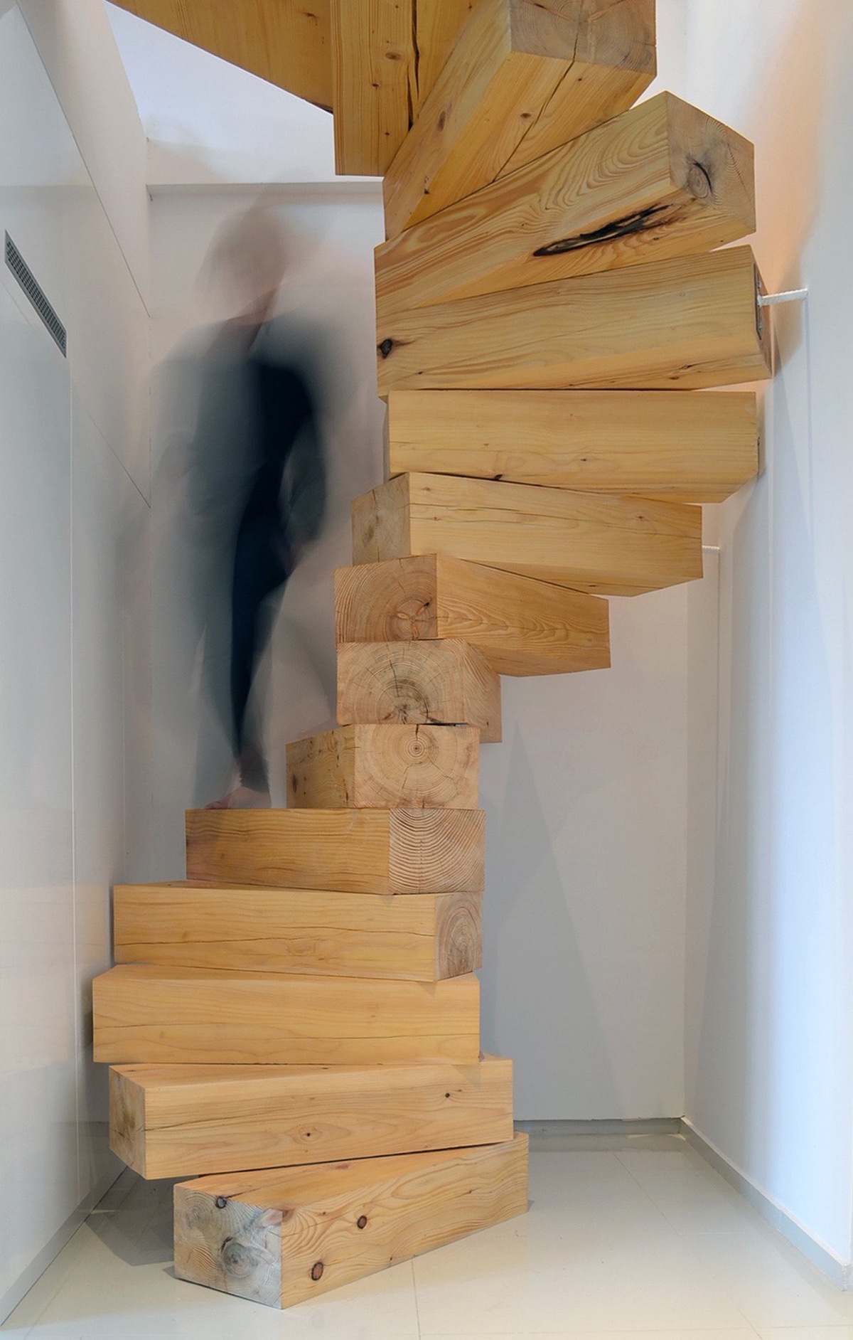Work with what you have. Whether or not this staircase was built from actual architectural offcuts, this chunky tread staircase would make the perfect addition to a home filled with upcycled curiosities. The heavy wooden steps would also be at home in a modern rustic setting, or in an industrial vibe pad where raw concrete reins alongside a plethora of plants.