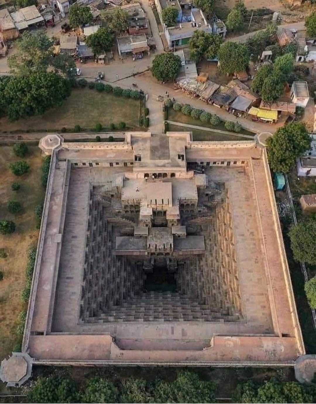 Built In The Abhaneri Village Of Rajasthan, India, It Is More Than 1,000 Years Old And Is 100 Feet Deep With 13 Floors And 3,500 Symmetrically Placed Thin Steps!