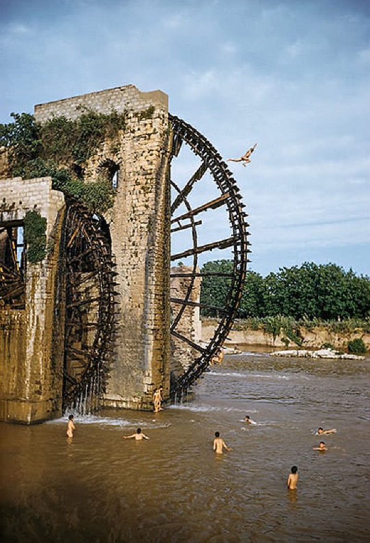 The Norias Of Hama Are A Group Of Large Water Wheels Located Along The Orontes River In The City Of Hama, Syria