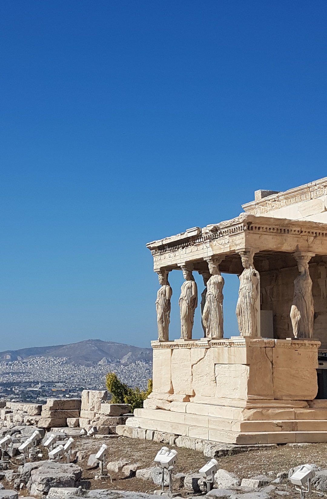Athens, Greece A Caryatid Is A Sculpted Female Sculptural Figure Used As A Pillar, Serving As An Architectural Support. The Greek Term Karyatides Comes From An Ancient Town In The Peloponnese, Meaning "Daughters Of Karyai"