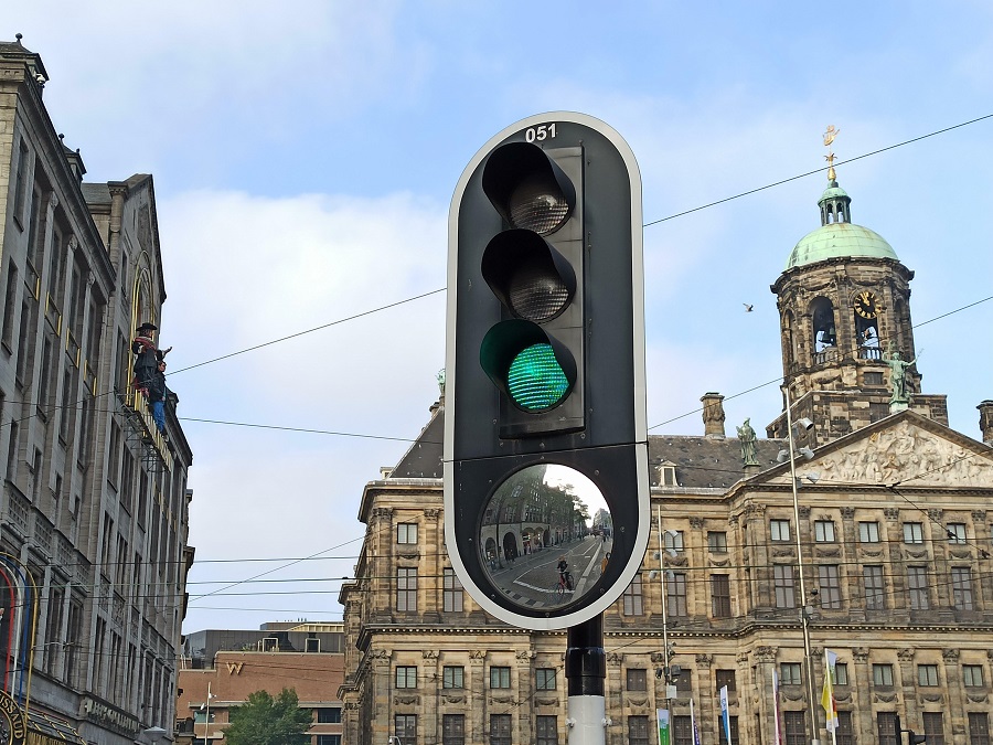 Traffic Light With A Mirror To Allow The Drivers To See The Pedestrians/Cyclists That Are In Their Blind Spots