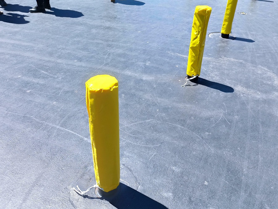 Yellow Covers To Increase The Visibility Of Bollards During An Event