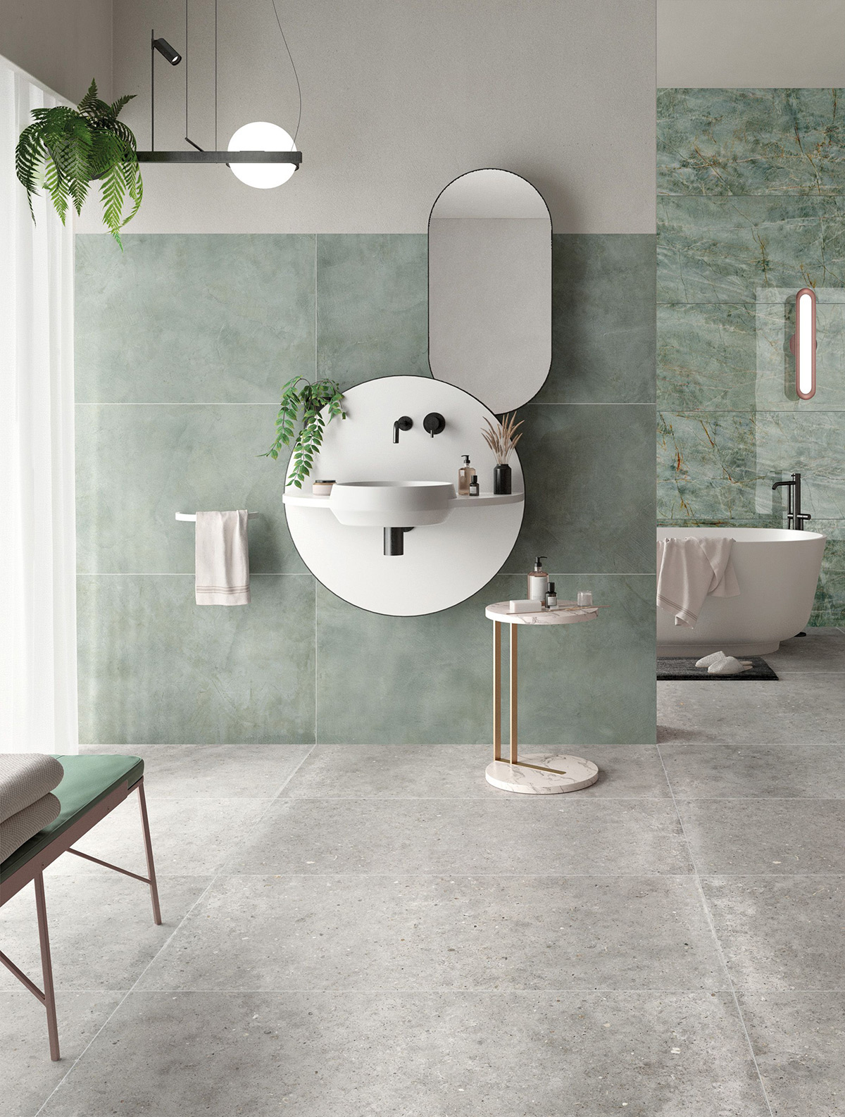 Large-format green tiles increase the sense of space in a bathroom.