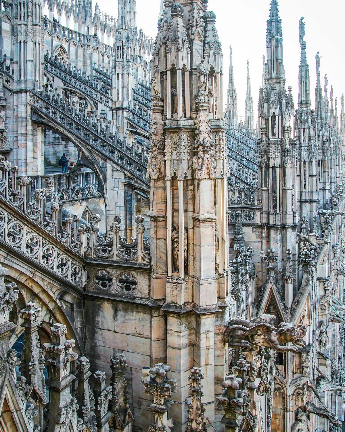 Pinnacles And Spires On The Flying Buttresses Adorned With Statues And Stone Carvings, Milan Cathedral, Milan, Lombardy, Italy