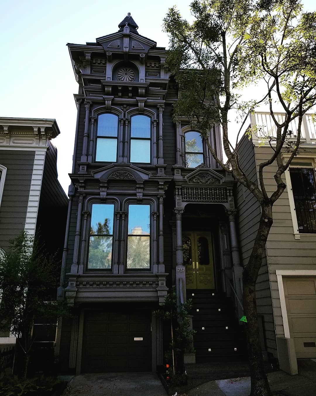 A Narrow Black Victorian Townhouse In San Francisco