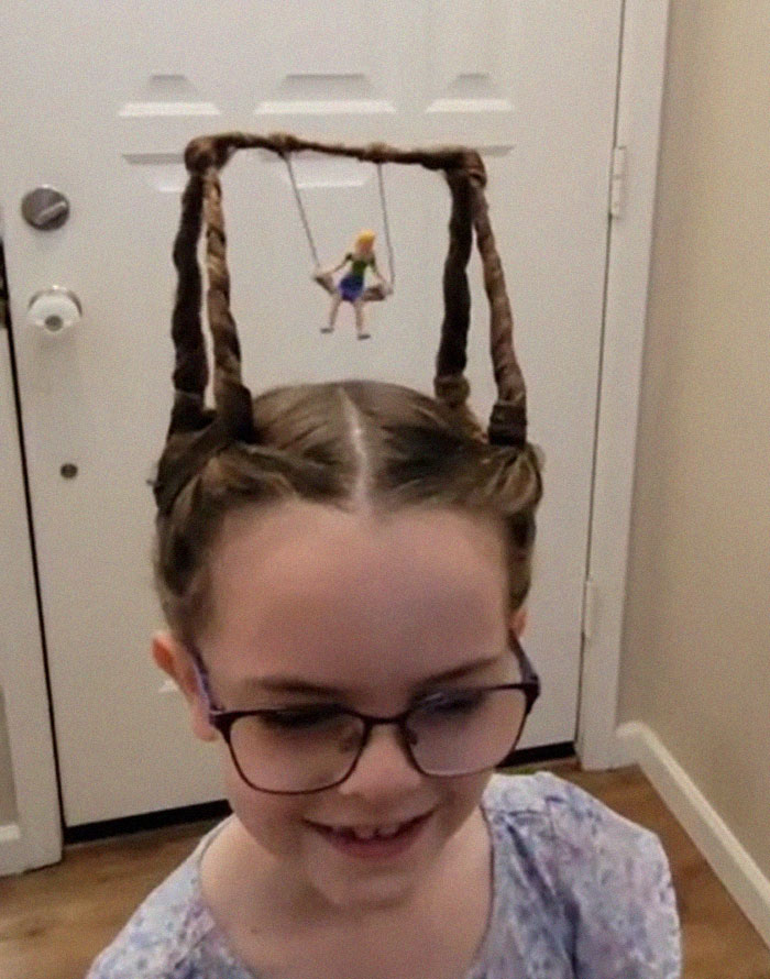 It's Crazy Hair Day, A Small Swing Made With Her Hair