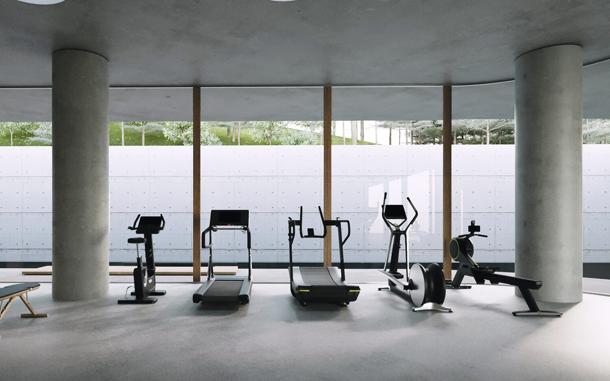 Various gym equipment lines up along the window wall, whilst mats are spaced along the back for floor work.