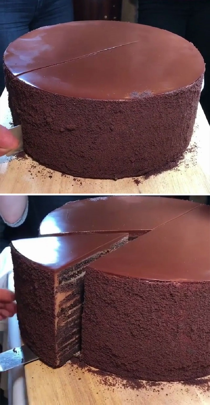 Cutting A Slice Of 23 Layer Chocolate Cake