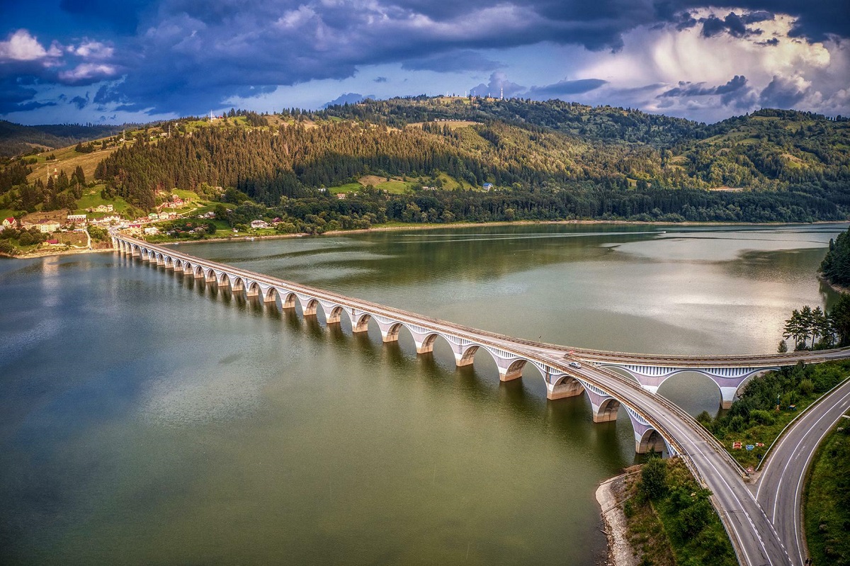 The Bridge Over The Mountain Spring Lake In Romania