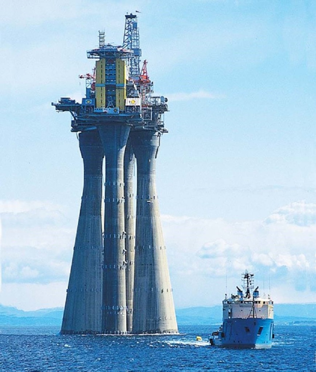 Troll-A, Over 1500 Feet Tall, Being Taken Out To Sea Before Its Legs Are Sunk To The Ocean Floor