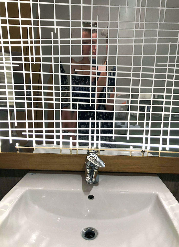 Bathroom Mirror At A Bar In Italy