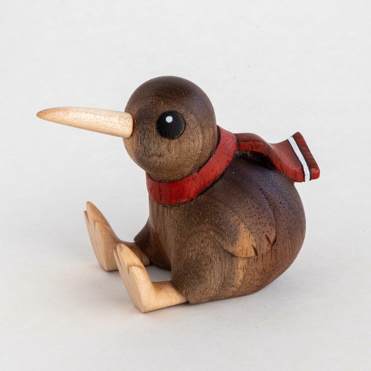 I Carved A Kiwi, His Name Is Fred, And He Dreams Of Flying (Walnut And Maple)