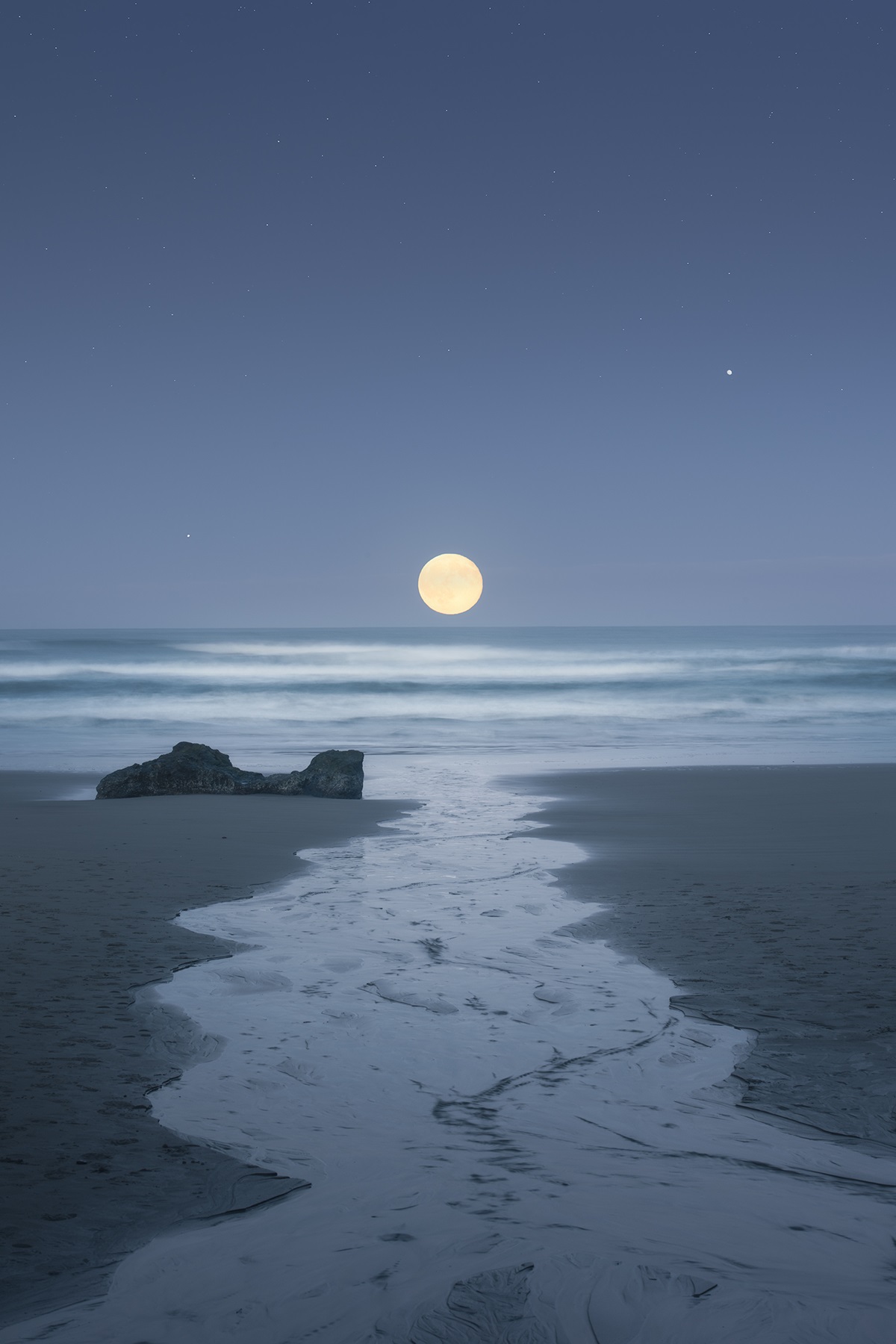 The Moon Setting On The Oregon Coast