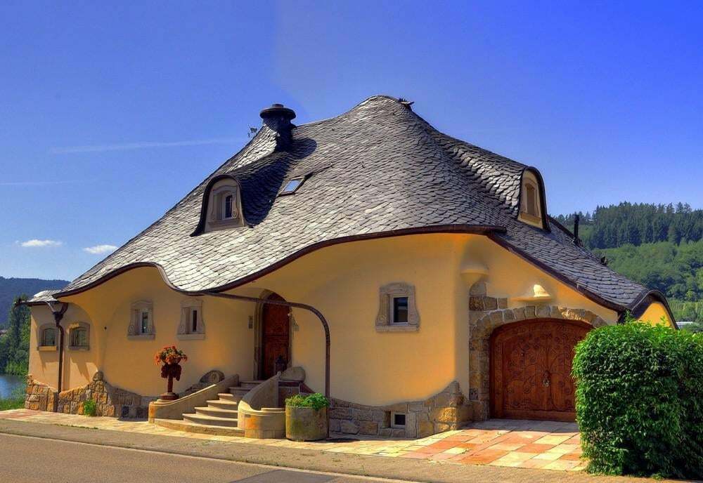 Low-Energy Organic House Design With "Wild Slate Roof," Germany